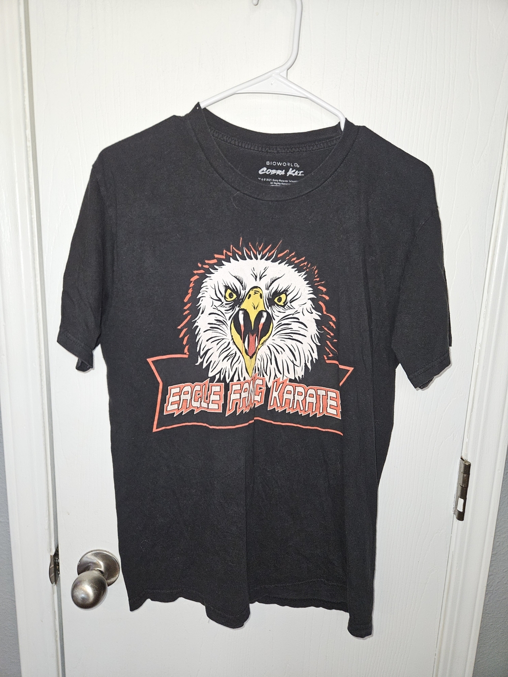 Bioworld Black Tee with Yellow-Accented Eagle Graphic